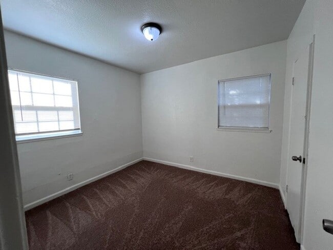 Building Photo - Fresh paint and new carpet.