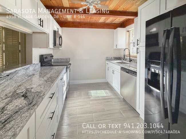 Building Photo - 4958 Village Garden Dr