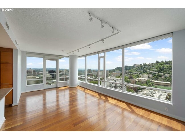 Building Photo - Modern 2-Bed/2-Bath Condo with Balcony & Prime Downtown Location
