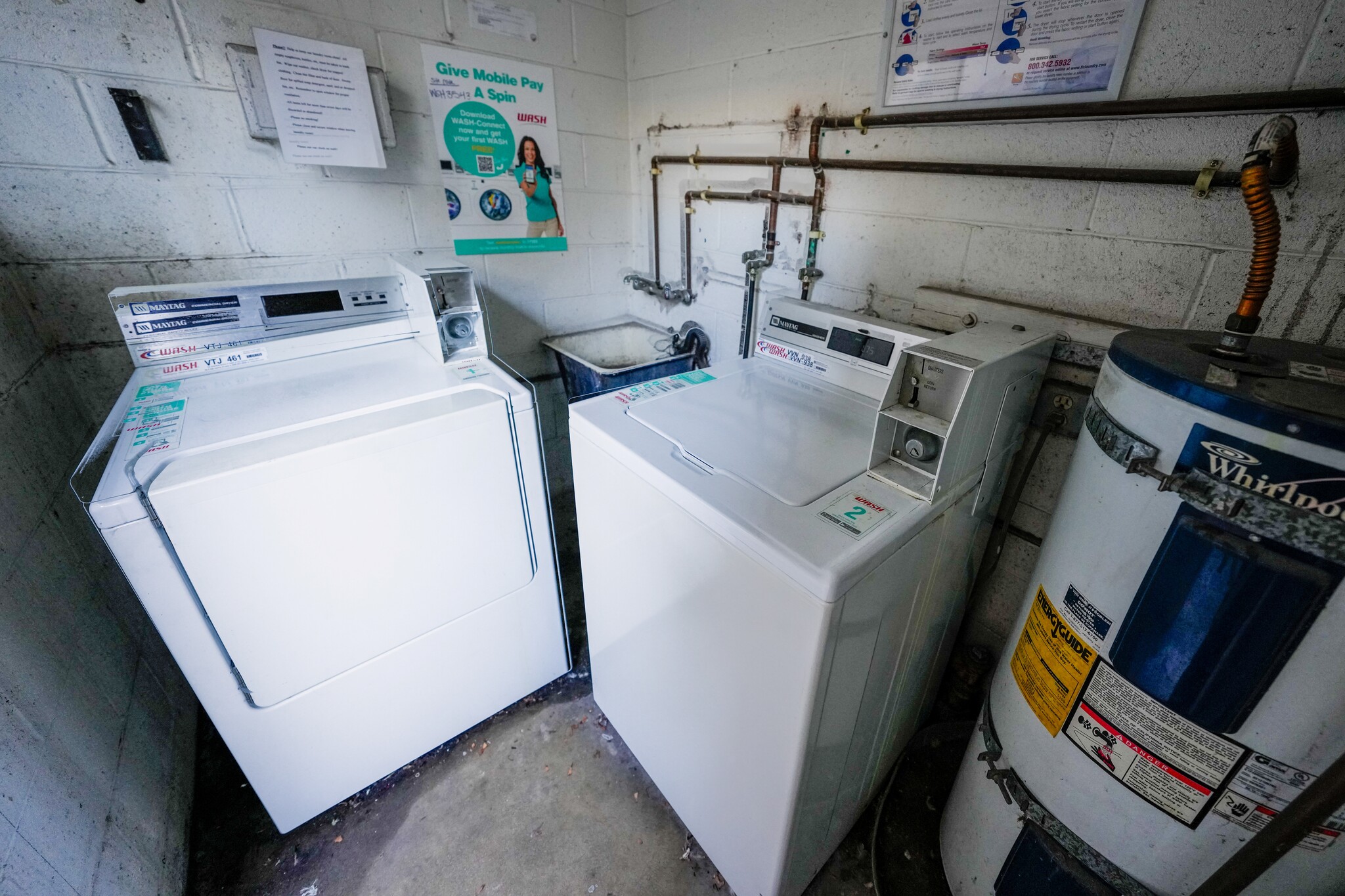 Laundry room in complex. - 1054 E 2nd St