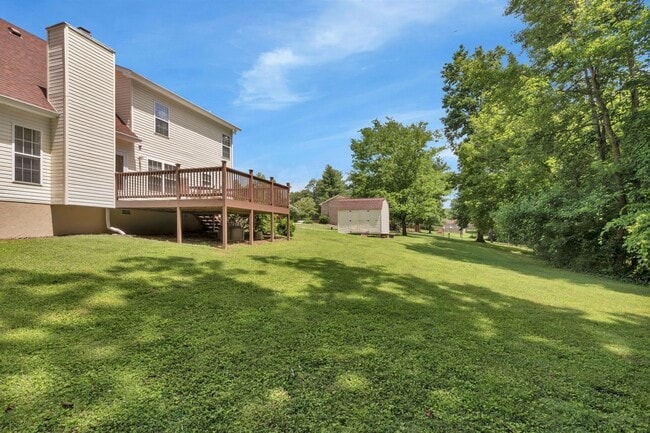 Building Photo - One acre lot with first floor suite in bea...