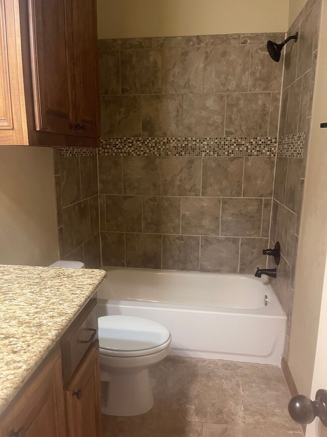Building Photo - Fully Furnished Three Bedroom, Two Bathroo...