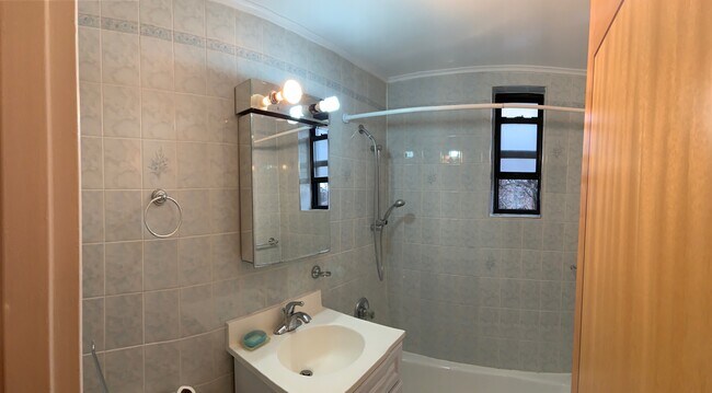 Bathroom and shower - 67-30 Dartmouth St