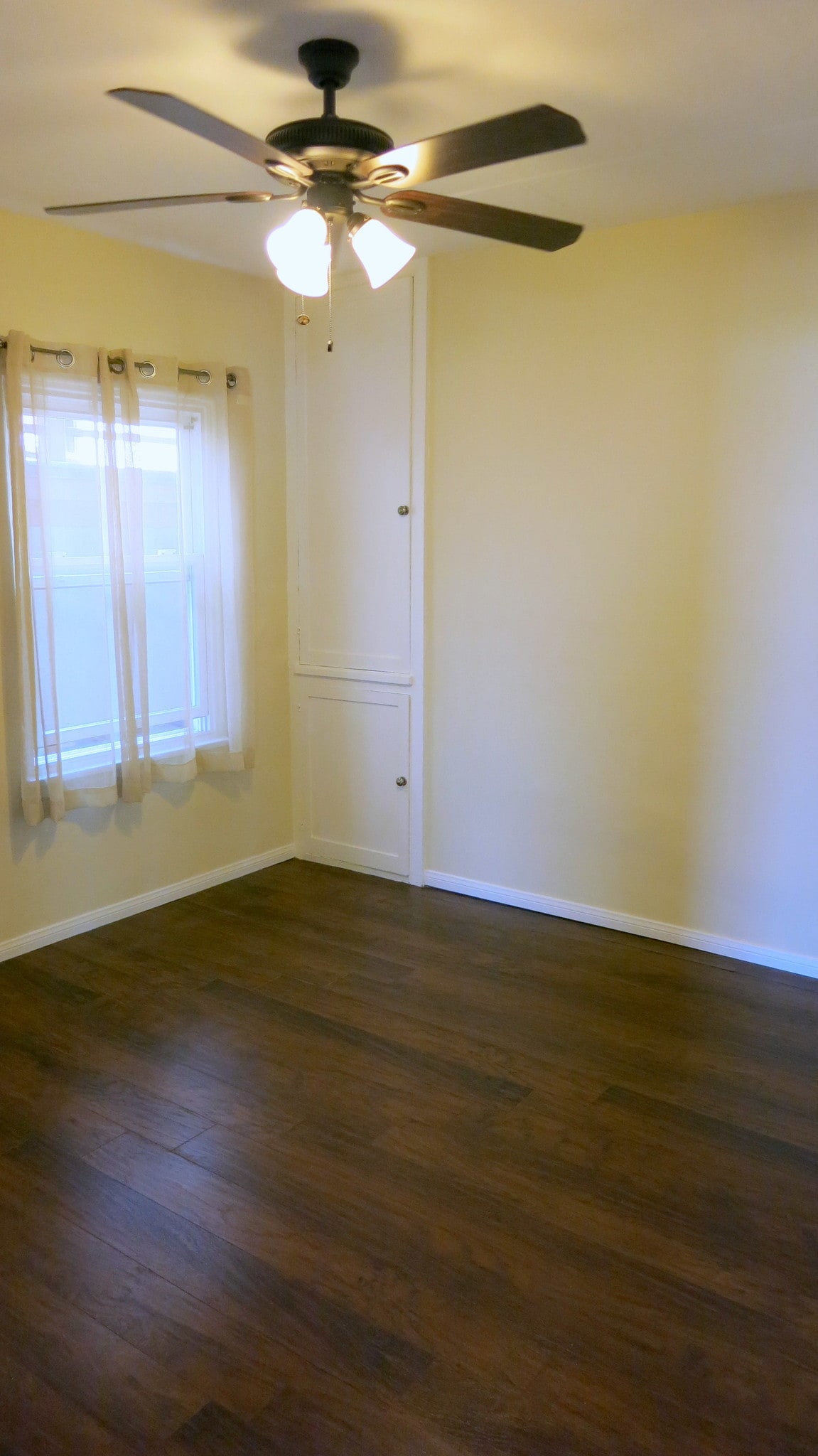 Bedroom with deep shelve cabinets in corner. - 3607 Crest Dr