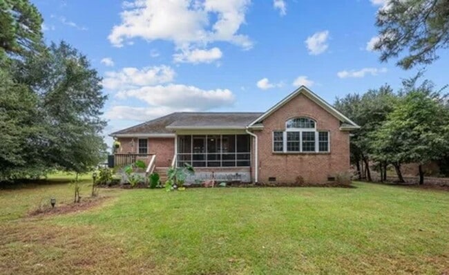 Building Photo - **Stately Brick Home in Fairfield Harbour | Tray Ceiling, Column, Bonus Room & Screened Porch**