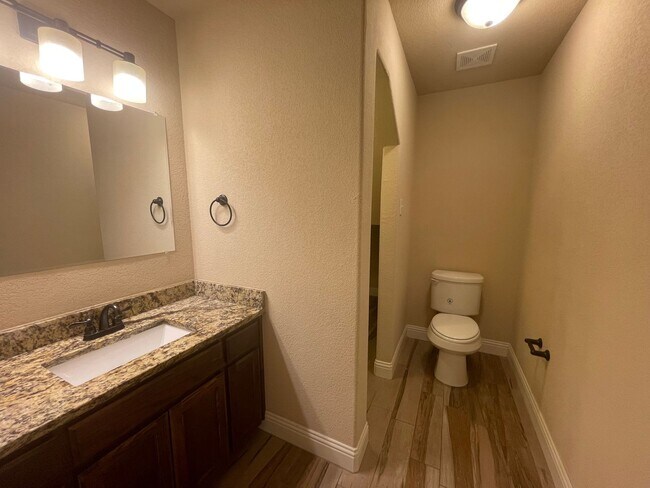 Building Photo - Beautiful Benbrook 3B/2.5B Townhome ((Stainless Steel Appliance Package)) Dazzling wood-like tile...