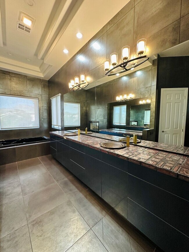 Building Photo - Stunning home with pool in prestigious Eagle Hills!