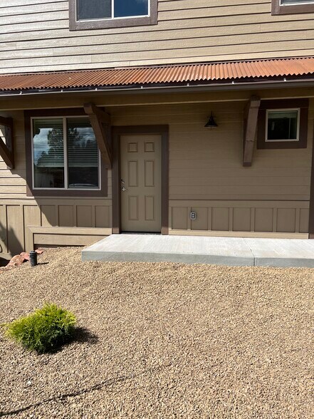 Back porch and 2nd entry to unit - 1650 E Ponderosa Pkwy
