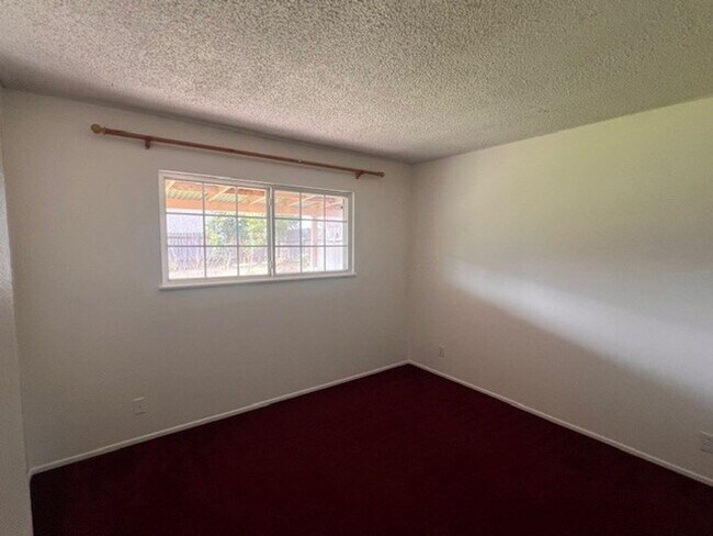 Building Photo - Charming Home with Expansive Yard, Fruit Trees & RV Parking