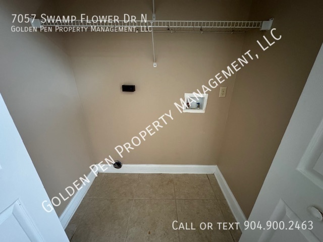 Building Photo - 7057 Swamp Flower Dr N
