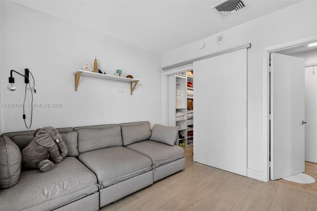 Building Photo - 10275 Collins Ave