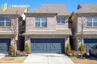 Building Photo - Luxury Townhome- wood flooring. Great location