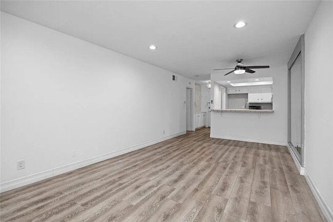 Building Photo - "Charming 1-Bedroom Furnished Retreat with...