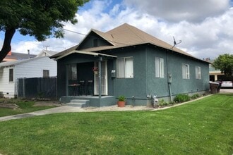 3 bedroom home with front and back yard - 412 N Claudina St.