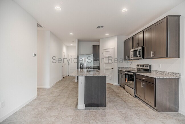 Building Photo - 5549 E Cinder Ln