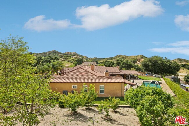 Building Photo - 27048 Triumph Ave