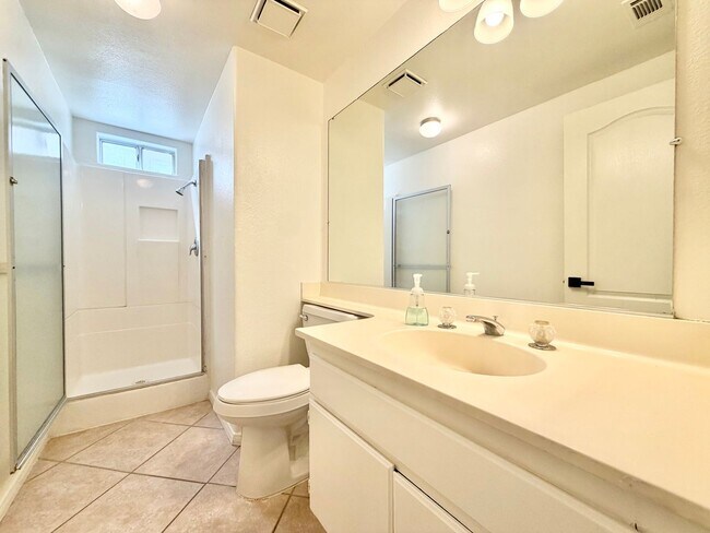 Building Photo - Spacious 5 Bedroom 3 Bathroom Home with Updated Paint, New Roof & Private Balcony