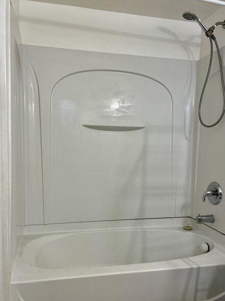 Tub & Shower - 208 W 14th St