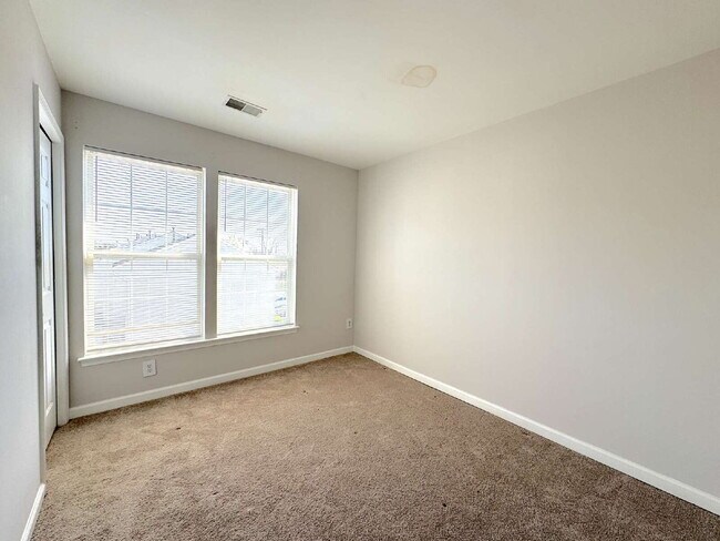 Building Photo - Inviting Suburban Retreat with Spacious Layout and Timeless Hardwood Flooring