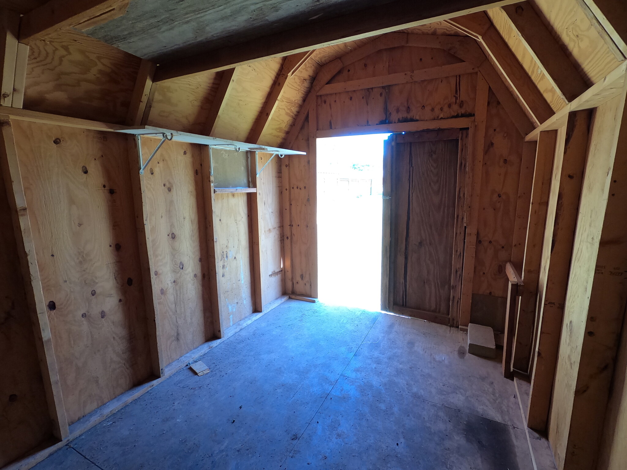 View of inside of storage building looking out to front door - 415 W Guthrie St