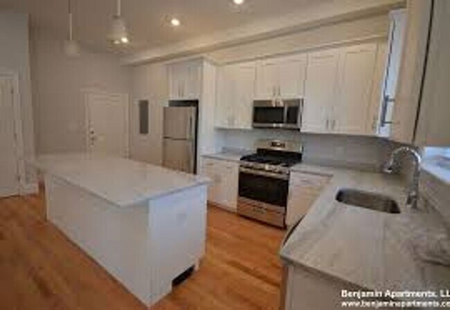 Building Photo - No Brokers Fee, No Security Deposit, New Kitchen Appliances, Central Heat/AC, Laundry on a Site, ...