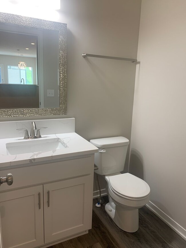 Building Photo - Walkout ranch townhome with 2 stall garage...