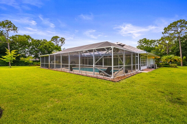 Building Photo - 7903 Plantation Lakes Dr