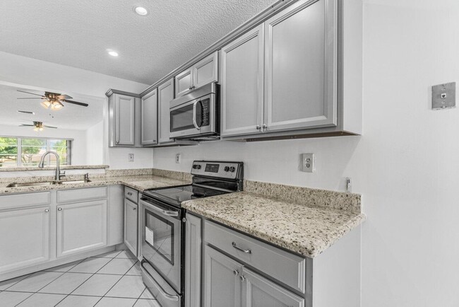 Building Photo - 5710 Princess Palm Ct