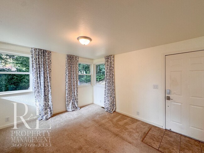 Building Photo - Private Retreat with Expansive Yard & Loft Space