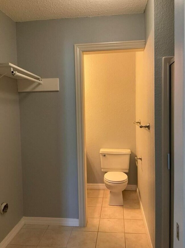 Additional bath and laundry - 921 Century Dr