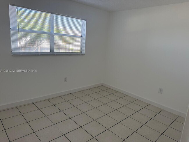 Building Photo - 8600 Sunrise Lakes Blvd