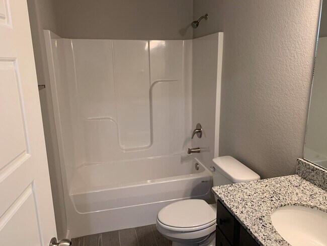 Building Photo - 3- Bedroom, 2-Bath, Double car garage Dupl...