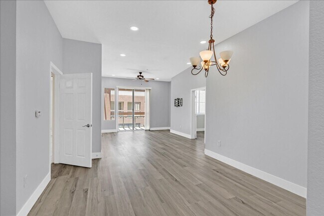 Building Photo - Top level 2 bedroom condo located in guard...
