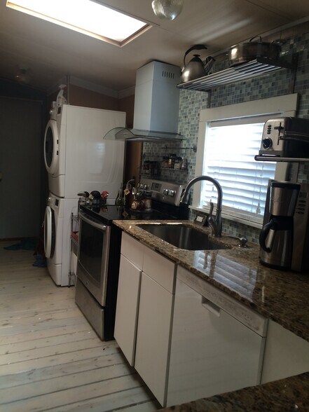 Large SS sink with pullout faucet. - 3000 Clarcona Road