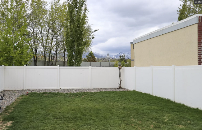 Generous backyard with privacy fence enjoys views of the Utah State Capitol and the Salt Lake Bench - 584 N 8th W