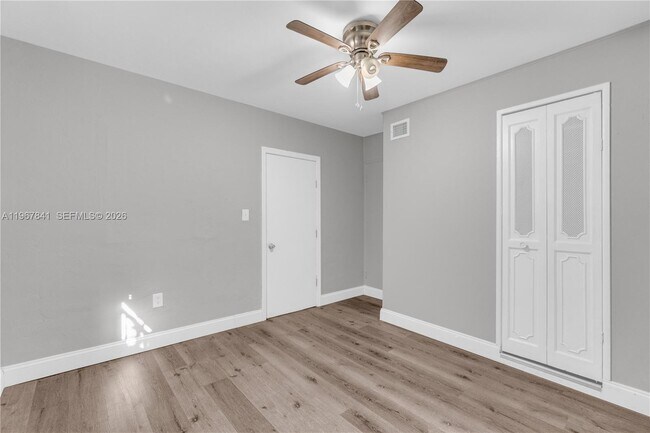 Building Photo - 6940 NW 6th Ct