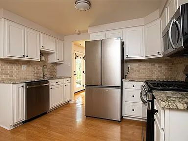 Building Photo - Charming 4-Bed Retreat with Finished Basem...