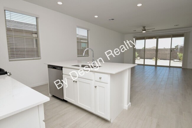 Building Photo - Modern 3 Bedroom 2 Bath Gladden Farms Home with 3-Car Tandem Garage