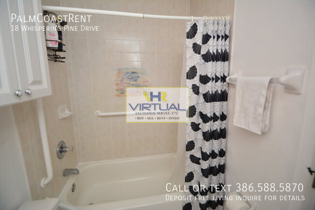 Building Photo - 18 Whispering Pine Dr