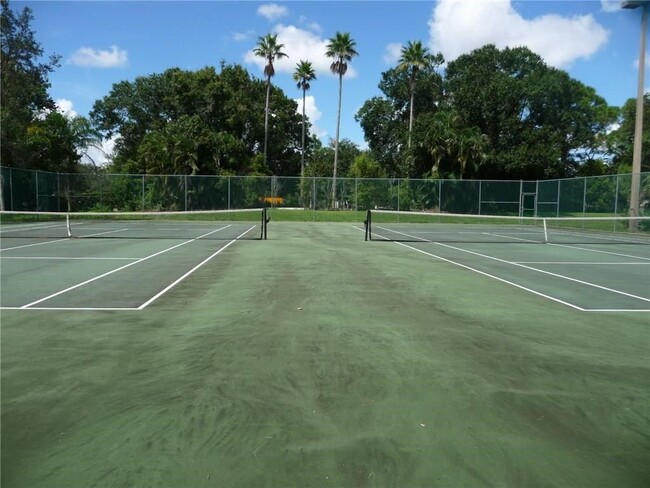 Renovated tennis courts. - 1935 Silver Pine SW Way