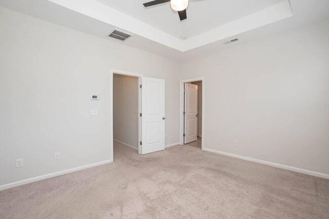 Building Photo - Four Bedroom Townhome!