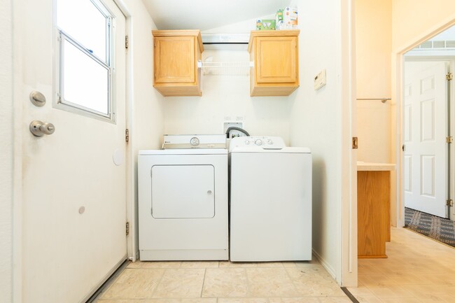 Building Photo - "Charming 3-Bed, 3-Bath Mobile Home on Per...