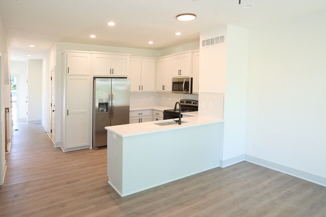 Kitchen from living room - Eagle Creek Townhomes