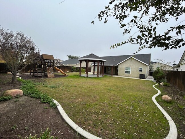 Building Photo - You have to see this yard and patio in the Vineyard subdivision in Northwest Hanford