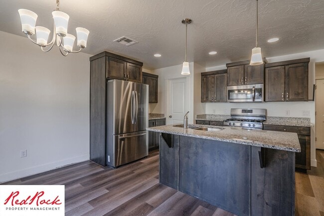 Building Photo - Move In Special - $500 Off First Months Rent! Stunning 4 Bedroom Townhome!