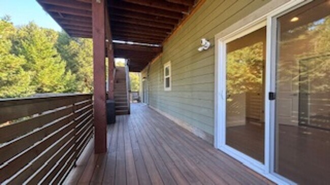 Building Photo - Stunning Tree-House Living with Beach Acce...