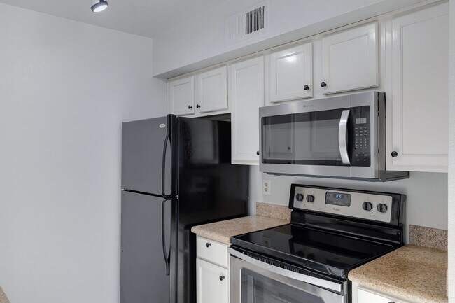 Building Photo - Welcome to Sunrise located in the Heart of...