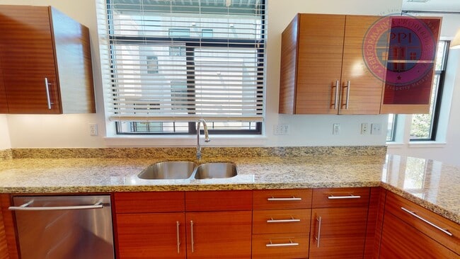 Building Photo - Riverfront Location, Luxury Townhome - End Corner Unit, Two En-Suites, Attached Garage