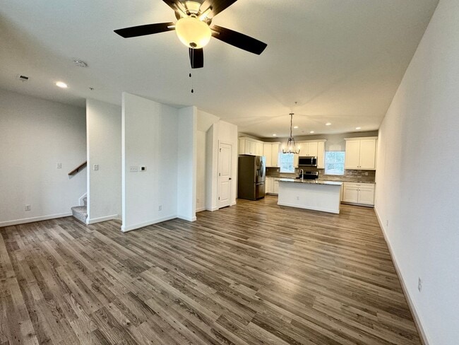 Building Photo - Practically New & Available NOW! Americana Luxury Townhomes! Pet Friendly! Attached Garage! All A...