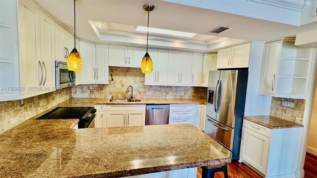 Building Photo - 19390 Collins Ave